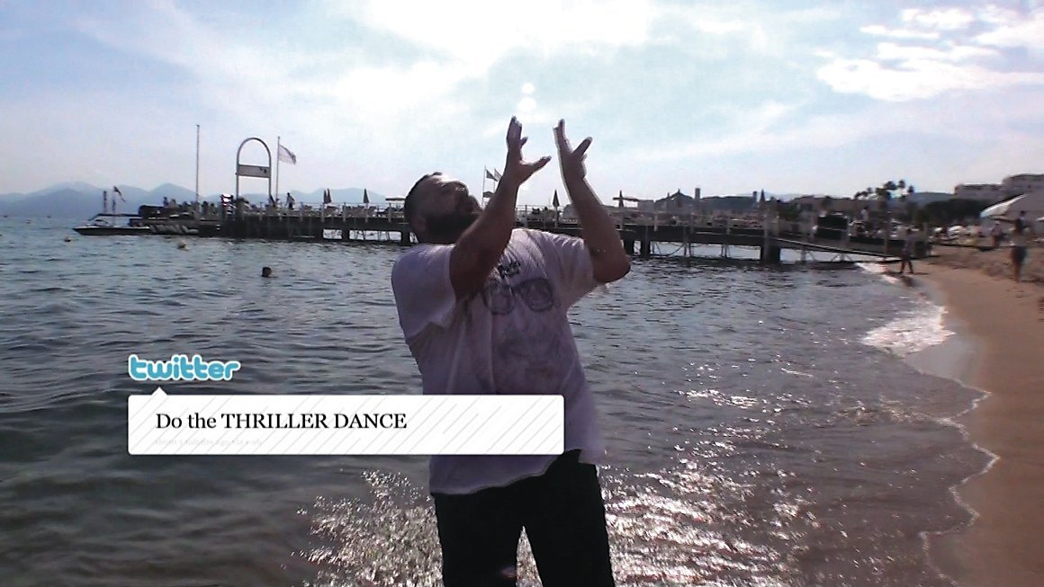 David dancing on the beach on the tweet command, do the Thriller dance